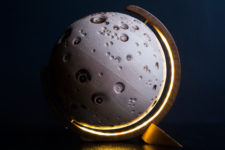 05 The Moon globe is carved of solid sycamore and resmebles a moon surface