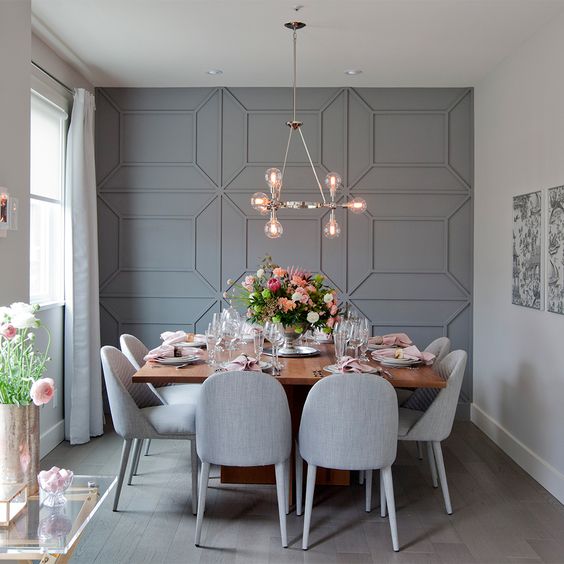 Grey geometric panels spruce up the neutral space and make it more eye catching