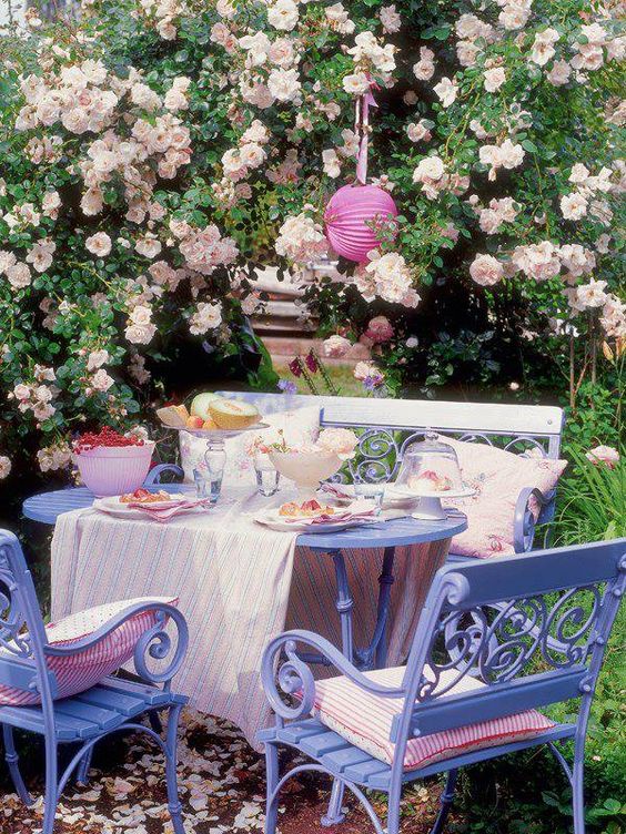 the dining set painted lilac and pink textiles for a welcoming and sweet dining space