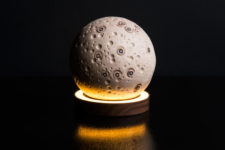 06 The Mini Moon rests atop a solid walnut base with lights