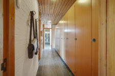 07 The corridor is also lined with similar wardrobes that are used for storage