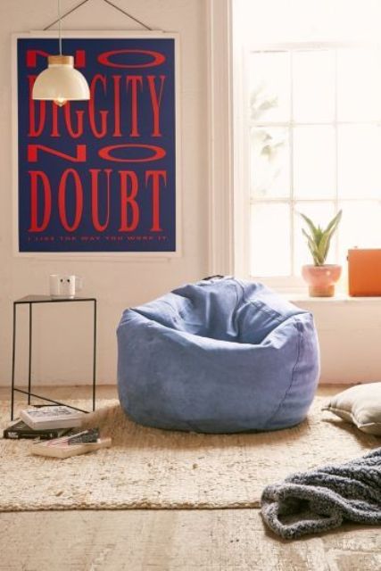 a small yet comfy blue bean bag chair will suit any space and will be loved by both an adult and a kid