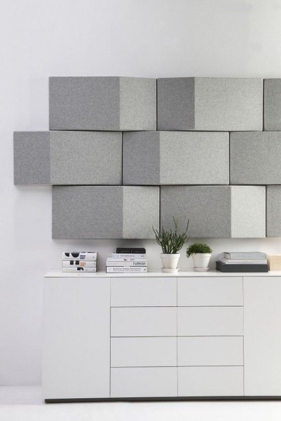 soundproof your space with geometric felt panels on the wall that will add a catchy touch at the same time