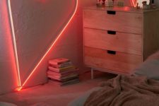 09 a heart-shaped neon light is a great idea not only for a girlish bedroom but also for a bedroom on the whole
