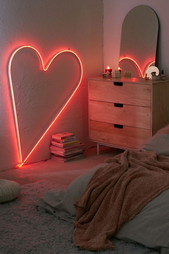 A heart shaped neon light is a great idea not only for a girlish bedroom but also for a bedroom on the whole