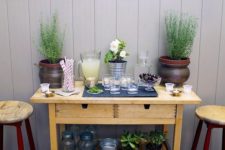 12 a simple outdoor bar made of an IKEA Forhoja cart painted in a neutral color – such an easy hack doesn’t require much skill