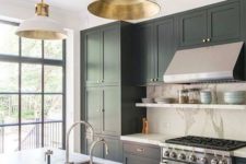 12 stainless steel of the appliances is the main here, and shiny gold adds to the space