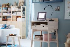 13 a little light-colored wooden standing desk won’t take much space and is suitable for tiny spaces