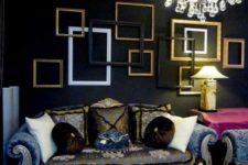 14 a moody refined space highlighted with an arrangement of frames in black, white and gold