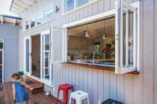 14 an outdoor bar with a bifold window to the kitchen is a cool space-saving idea