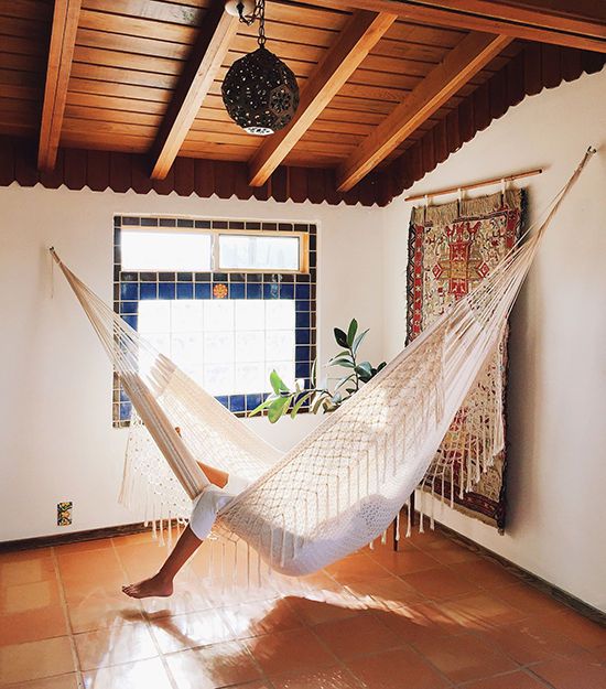 hanging a hammock in any indoor space instantly brings relaxed vibes there