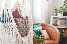 16 a boho space really requires a fringed hammock chair to complete it and bring an even more relaxed feel