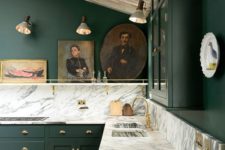 16 a dark grene kitchen with marble-style granite countertops that refresh the look