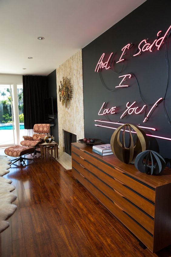 add romance to your living room with a whole wall done with neon lights and your space will shine