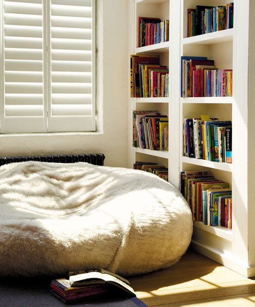 spruce up a reading nook with a large furry bean bag chair and make the space more informal and comfortable