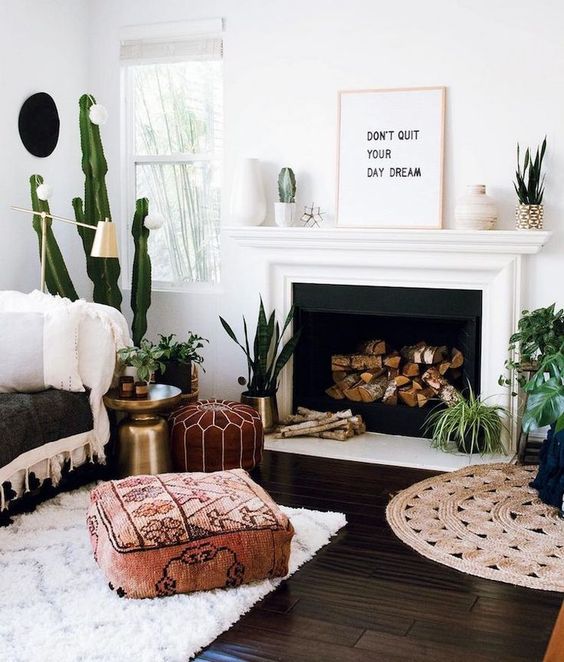 A Moroccan styled and fabric printed ottoman help make this space more boho like