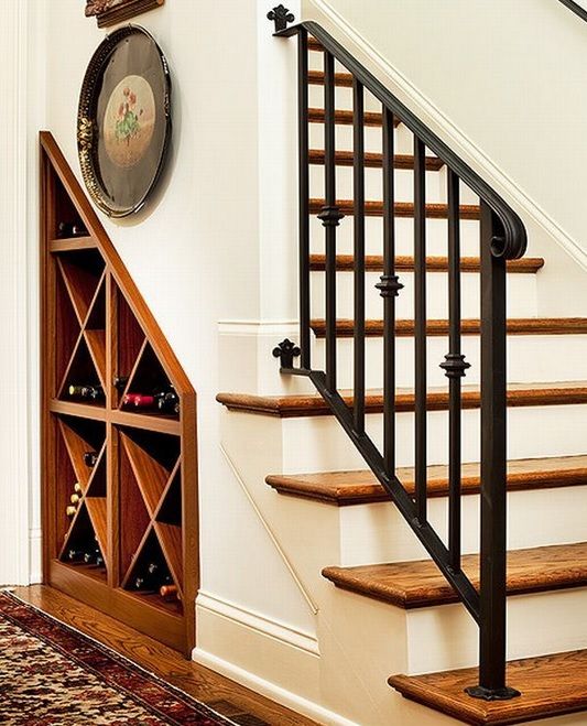 A built in wine storage space under the stairs will save much space and your wine will be at hand