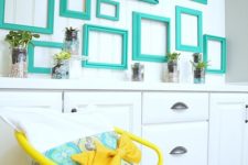 21 an all-white space can be infused with color with bright furniture and empty frames in the color that you like