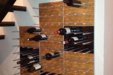 21a modern wine shelf mounted to the wall can holder a lot of bottles and they will be at hand