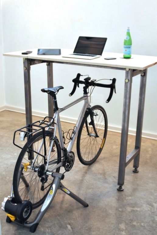 this desk allows you to kill two birds with one stone - get your desk job done and keep fit