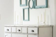24 a neutral shabby chic space is injected with color using aqua-painted frames on the wall