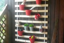 25 IKEA Lattenrost turned into a a cool wall-mounted planter holder, which is ideal for small spaces