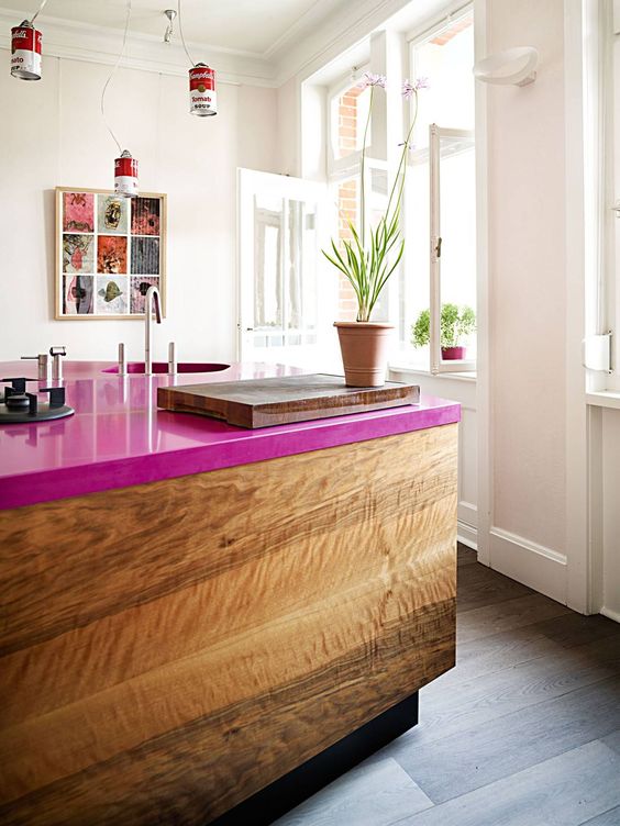Add a magenta countertop to your usual kitchen island and spruce it up with a cool color