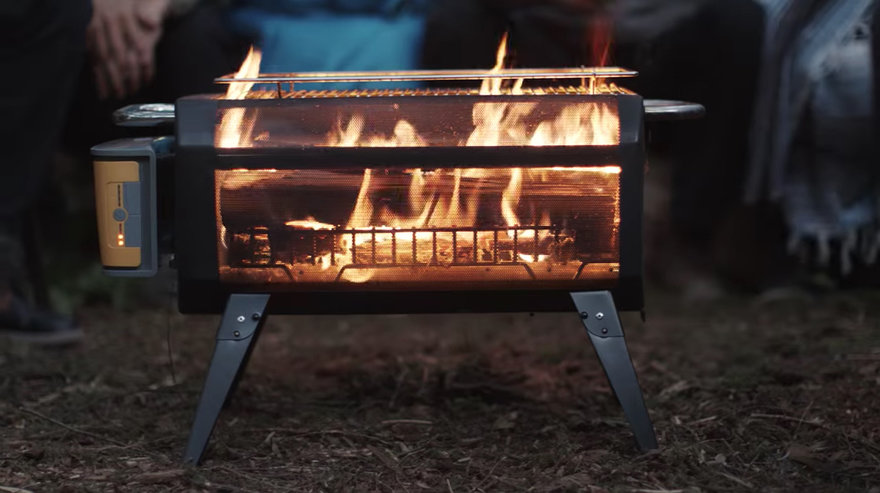 FirePit is a modern portable fireplace that allows cooking and charging your devices at the same time