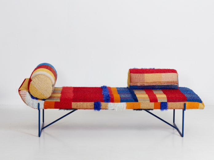 Loom is a colorful and bold chaise longue with a throw done with textural upholstery inspired by the 1950s and 1960s
