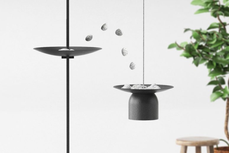This interactive lamp is a creative piece with marble stones that are used for adjusting its height