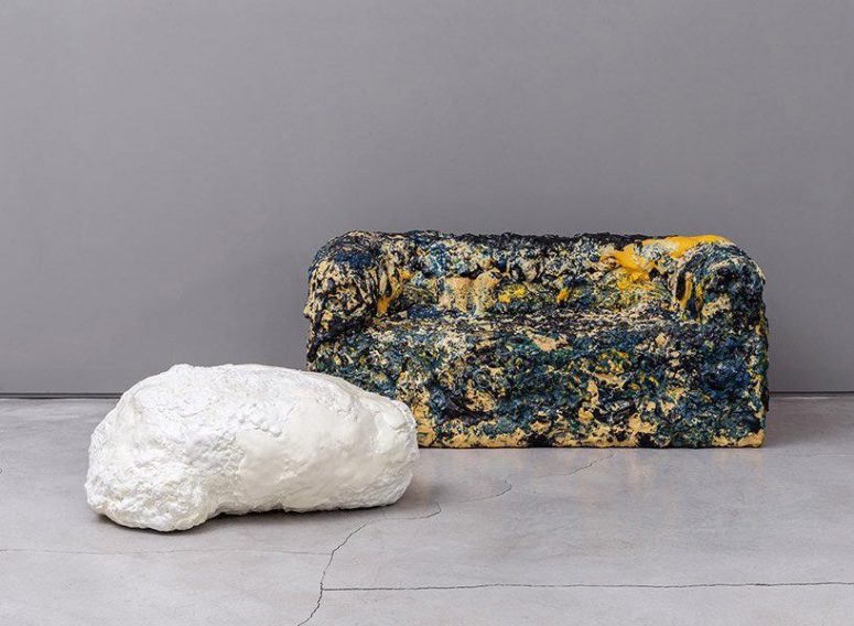 This unique foam furniture is inspired by meteorites and is painted bold to add impact to the space