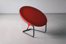 02 The chair consists of black pipe, red fabric and a seat itself