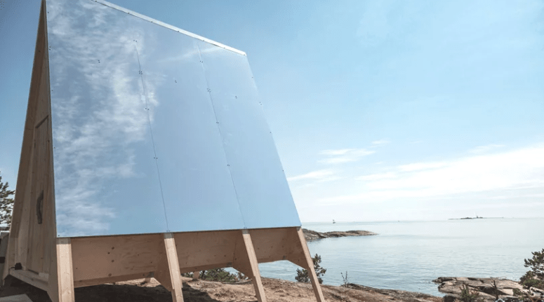 The energy is generated with these large solar panles, and the cabin itself is made of light-colored wood