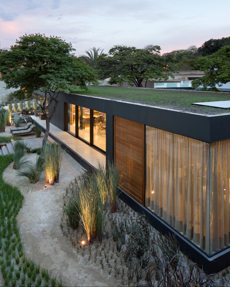 The house features a green roof and photovoltaic panels for more sustainability