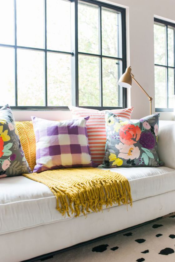  choose bright and printed pillows to elevate your plain room to a new level