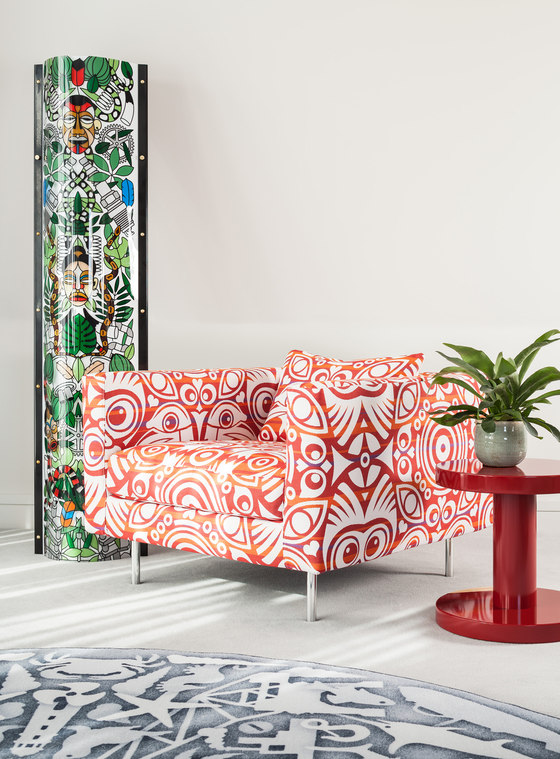 The spaces are spruced up with bright upholstered furniture inspired by Dutch designs