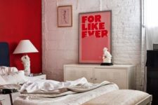 03 a red accent wall is a bold statement in this white and off-white bedroom and an artwork matches