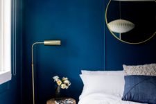 03 bold blue walls make a statement and look very chic with gilded touches