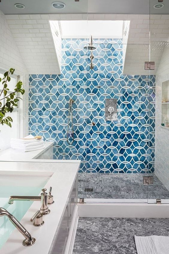a statement blue tile wall in the shower is a chic idea and will highlight your shower area