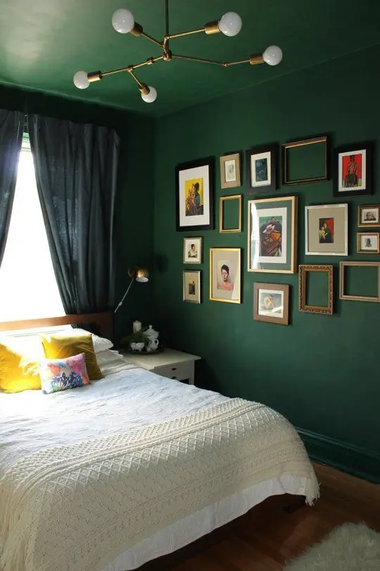 a whole room done in forest green - the walls and the ceiling for a trendy moody look