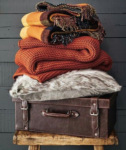 Add some knit and usual blankets in the fall shades   rust, orange, brown