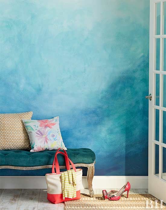 bold blue as a dominant color and dark green as an accent one make this entryway extra bright