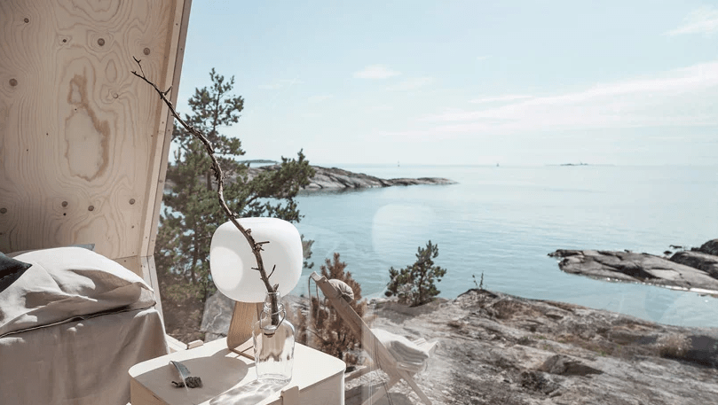 The furniture and lamps are Scandinavian and simple, nothing here distracts from the views