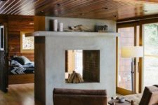 05 a concrete clad fireplace isn’t only a space divider here but also a focal point that provides coziness