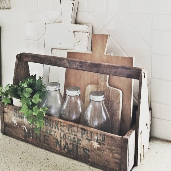 A rustic kitchen will look nice with a caddy made of an old too box with some stenciling