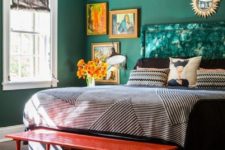 05 bold emerald walls make up a cool colorful space and artworks and furniture continue it