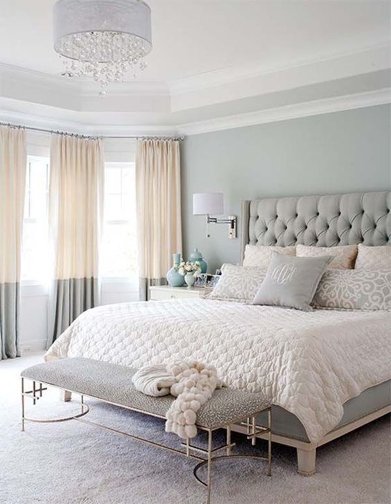 a grey bedroom with touches of cream looks very soft and subtle and makes you feel relaxed