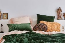08 a bright and welcoming bed with a boho feel with green velvet and a woven fringe pillow