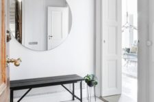 08 a mirror is a must for an entryway and it makes a space larger, which is essential for a small space