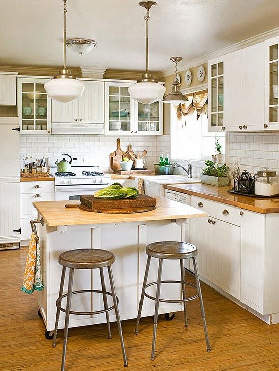 a rustic kitchen island with a wooden countertop, on casters and with holders can double as a meal space